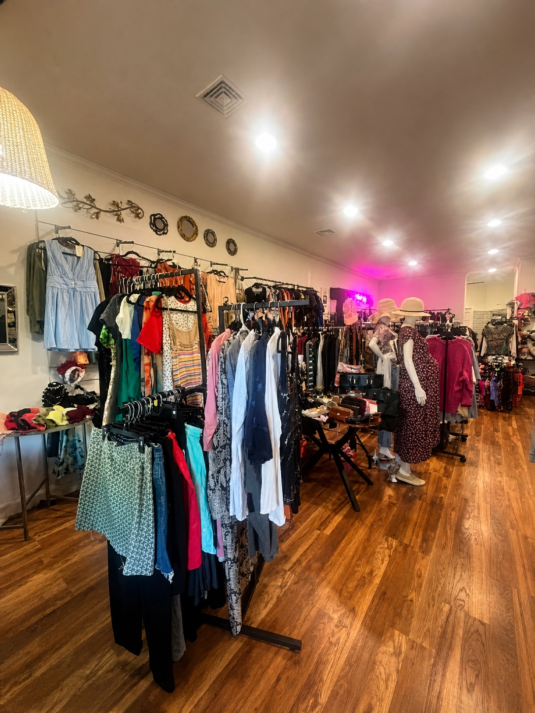 Racks of clothing inside The Style Exchange boutique thrift store